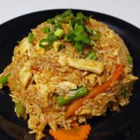 Spicy Basil Fried Rice · Vegan.Fresh basil, bell pepper, carrot, with basil sauce, Topped with green onion, cilantro,...