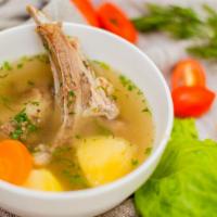 Shurpa Soup · Traditional Uzbek soup is made with chunky vegetables and beef.