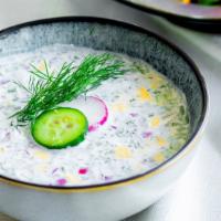 Okroshka · Greens, cucumber, egg, meat, and potatoes in yogurt (seasonal).
