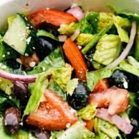 Greek Salad · Mix of fresh tomatoes, cucumbers, onions, parsley, sliced black olives, Feta cheese.