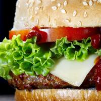 Cheeseburger · One slice of Kraft American cheese melted on fresh patty grilled to perfection and placed on...