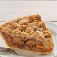 Apple Crumble  Pie Slice · our signature pie. Hand-cut apples cooked with sugar and spices, topped with our signature b...