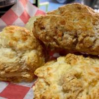Rosemary Cheddar Biscuit · add egg & bacon for an additional charge.