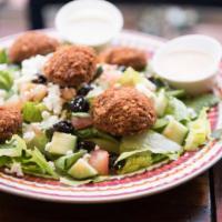 Falafel Salad · Olives, tomatoes, cucumbers, falafel, romaine lettuce, feta cheese and tzatziki dressing.