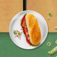 Wanna Italiana Sub · Ham, salami, provolone cheese, lettuce, and tomato served on a hero roll.