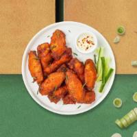 Chicken Wings · Fresh chicken wings fried and tossed in your choice of sauce. Served with your choice of dip...