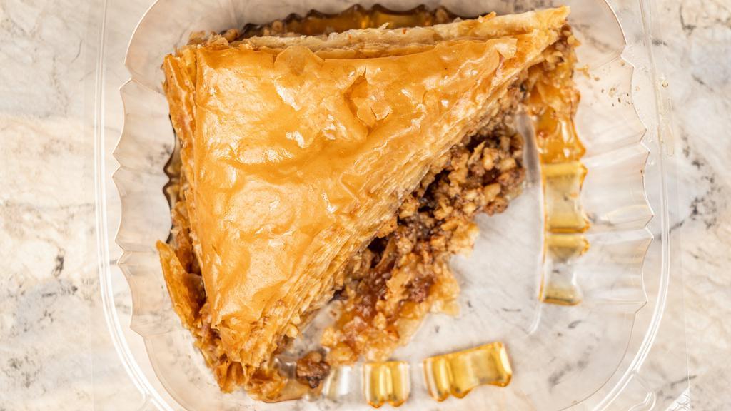 Baklava · Layers of phyllo dough, honey, and nuts.
