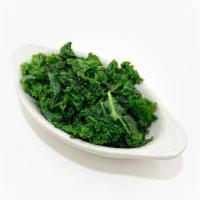 Side: Sauteed Kale · Kale sauteed w/ with garlic, onion & oil. Vegan, gluten-free, nut-free, soy-free.