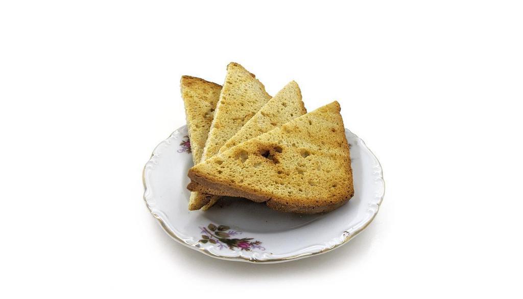 Side: Gluten-Free Toast (2 Slices) · Two toasted slices of our housebaked gluten-free bread. Vegan, gluten-free, nut-free, soy-free.