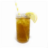 Iced Tea · 12oz Happy Earth organic iced tea - Earl Grey black tea & Genmaicha green tea blend. Mad...