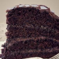Cake Slice - Chocolate Mint Oreo · Chocolate cake w/ chocolate icing & mint Oreo chunks. Vegan, nut-free. Contains gluten &...