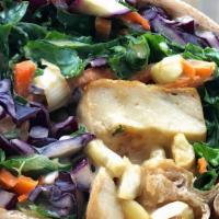 Sesame Kale Wrap · Kale, carrots, cabbage, sesame tahini, smoked tofu and cashews on whole wheat wrap. (can be ...