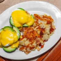 The Avocado Benedict · Avocado and tomato, two poached eggs on English muffin and Hollandaise sauce. Includes choic...