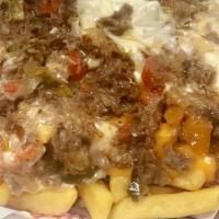 Steak And Cheese Fries Dinner  · steak and fries dinner 
comes with steak  onions , green peppers ,  and mushroom and fries