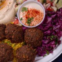 Falafel Plate · w/ Israeli salad, red cabbage salad, rice, hummus, tahini and pita