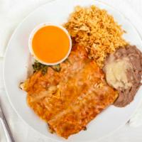 Enchiladas Mexicanas · Enchiladas stuffed w/ beef, chicken or cheese & covered w/ red sauce.