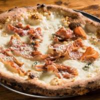 Saltimbocca Pizza · Fresh Mozzarella, Prosciutto Di Parma, Sage & White Wine Roasted in Wood Oven