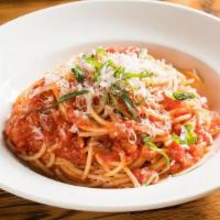 Spaghetti Pomodoro · San Marzano Tomatoes, basil, Olive Oil & Parmigiano Reggiano