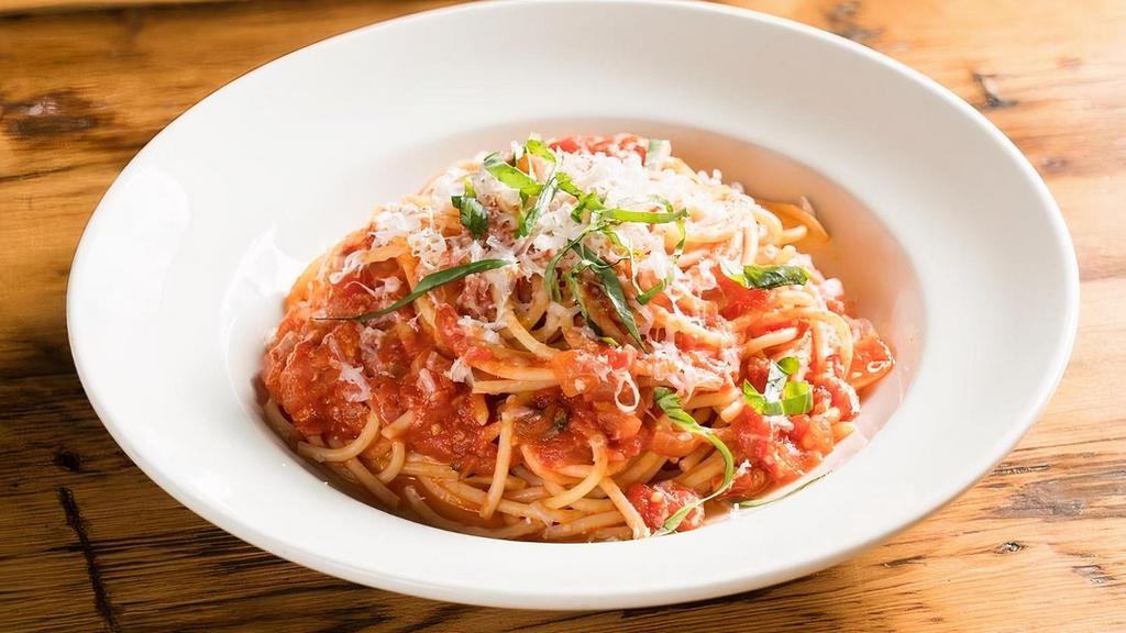 Spaghetti Pomodoro · San Marzano Tomatoes, basil, Olive Oil & Parmigiano Reggiano