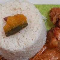 Chicken Stew With White Rice And Beans · The best and most delicious chicken stew with the combination of the best rice in town.