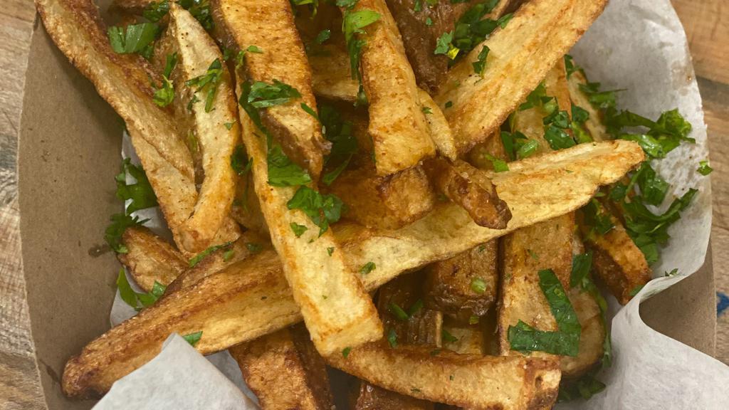 Hand-Cut Fried Potato · Hand-cut Idaho potatoes with skin on, fried in 100% canola oil, salt, and cayenne pepper. Served with homemade mayo.