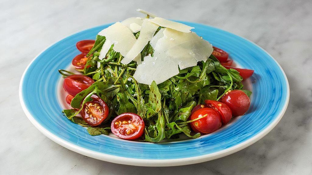 Pomodorini Salad · Arugula, cherry tomatoes, shaved parmigiano reggiano and balsamic vinaigrette.