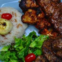 Mix Grilled · Chicken, adana kebab, lamb shish, meatballs served with rice, and mix green salad.