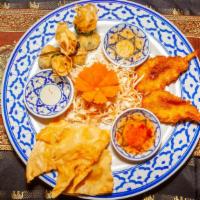 Bkk Sampler · Mixed appetizer including deep- fried shrimp wonton(3) ,butterfly shrimp(3), and golden pouc...