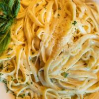 Fettuccini Alfredo · Served with bread and salad.