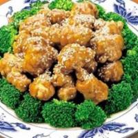 Sesame Chicken · In brown sauce. with rice.