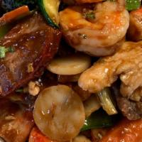 Happy Family · crab meat jumbo shrimp beef chicken roast pork sautéed with black mushroom mixed with vegeta...
