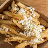 Greek Fries · Fries with oregano and feta cheese.