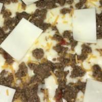 Meat Lovers Pizza · Pepperoni, ham, sausage, mushrooms, onions, and peppers with tomato sauce and fresh mozzarel...