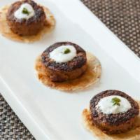 Galouti Kebab · Minced lamb patties and chef’s spice mix. Originally created for the royals of Awadh .