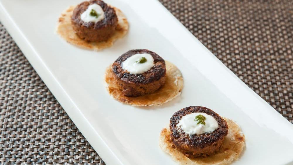 Galouti Kebab · Minced lamb patties and chef’s spice mix. Originally created for the royals of Awadh .