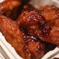 Chicken Wings With Garlic Sauce · Hot and spicy.
