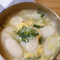 Rice Cake Soup · Rice cake and egg in broth.