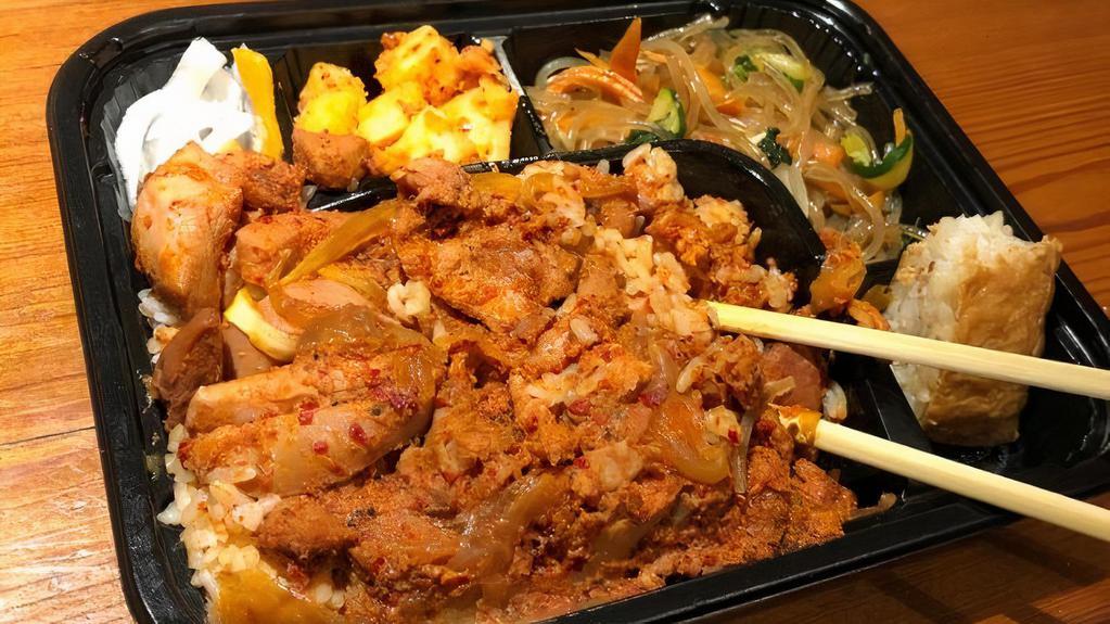 Spicy Chicken Box · Spicy chicken served with macaroni, seasoned radish, and rice.