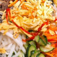 Beef (Bulgogi) Bibimbap · Bowl of warm white rice topped with various namul (assorted vegetables), beef, and topped wi...