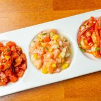 Ceviche Trio · Shrimp, tuna and salmon.