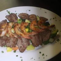 Steak Salad · House garden salad topped with tender slices of house roasted beef served with your choice o...