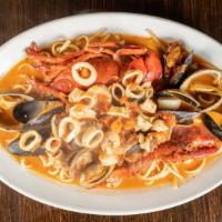 Linguini Pescatore · Half lobster, clams, calamari, and mussels.
