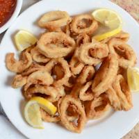 Calamari Fritti · Golden fried calamari served with a side of homemade marinara sauce.