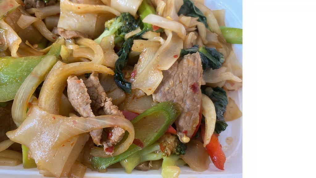 Drunken Noodle · Spicy. Broad rice noodle, chili paste, onion, Asian broccoli, Thai basil.