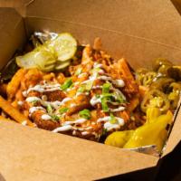 Loaded Fries · Seasoned fries loaded with nacho cheese, melted shredded cheese, a protein of your choice, j...