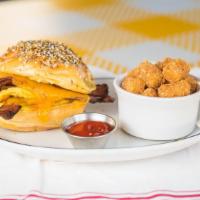 The New York Classic · Applewood smoked bacon, cage-free organic eggs and Vermont cheddar cheese on  a brioche bun ...