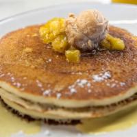Pineapple Upside Down Pancakes · Buttermilk pancakes with caramelized pineapple and topped with vanilla rum crème anglaise & ...