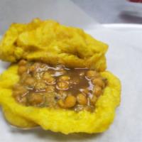 Doubles · Vegan. Doubles is a common street food in Trinidad and Tobago. It is a snack made with two b...