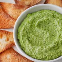 Edamame Hummus With Wonton Chips · Perfect appetizer to your balanced bowl.