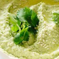 Edamame Hummus · Rich, lemony, high protein snack with your meal. Made with chick peas tahini, sesame seeds, ...
